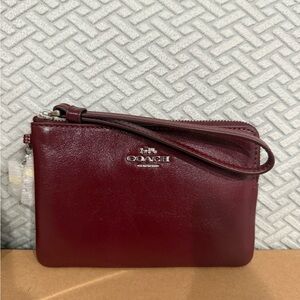 Coach Boxed Corner Zip Wristlet in Burgundy with charms